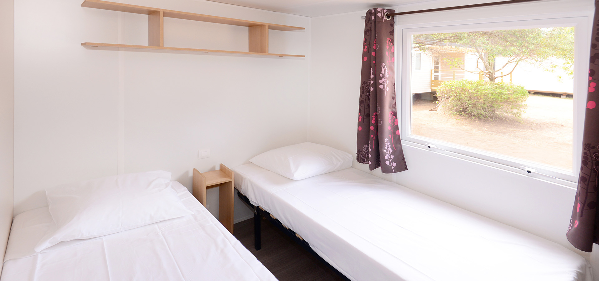 Camping la vetta location MH superieur 2CH chambre enfant